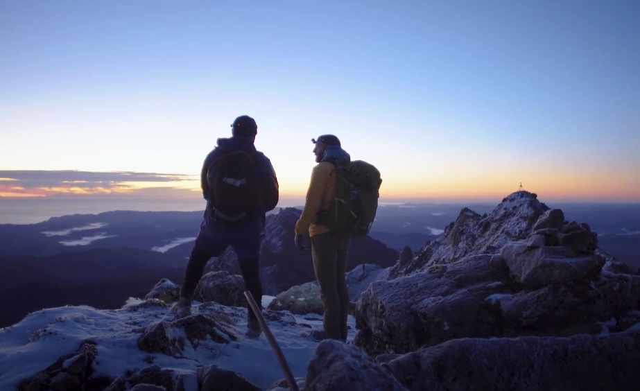 2 people at the top of Mount Hikurangi